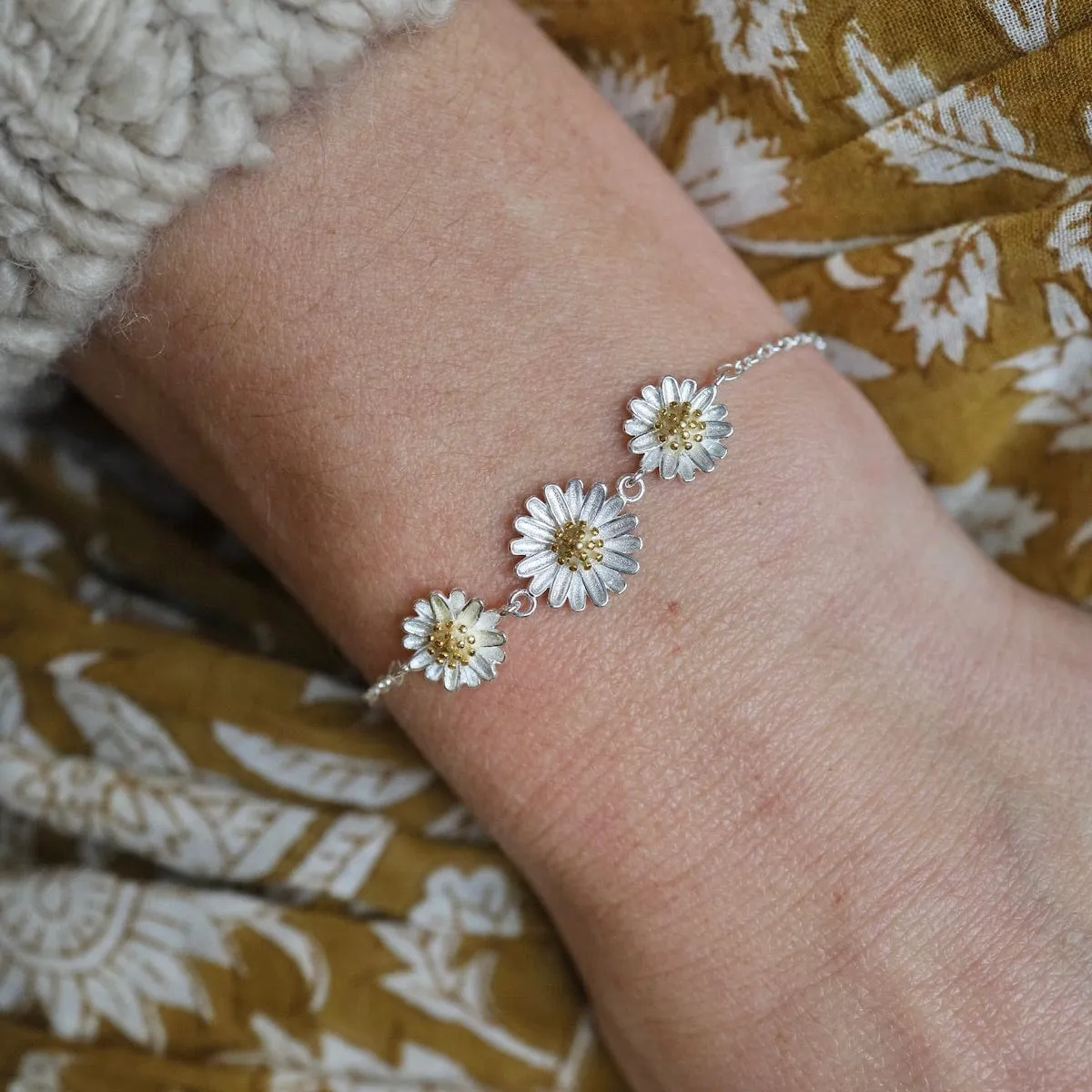 3 Silver Daisies with Gold Plated Centers Bracelet