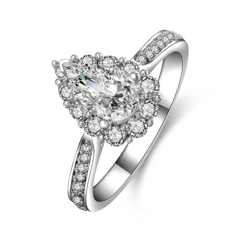 Handmade Pear Cut Halo Sterling Silver Ring